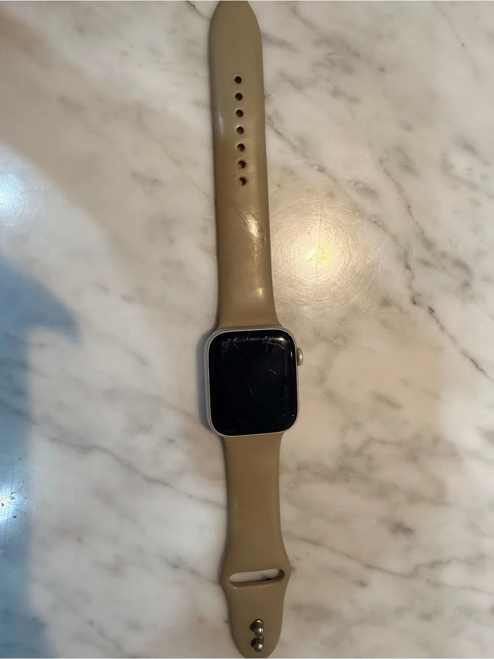 Apple Watch with Beige Silicone Band and Silver Case